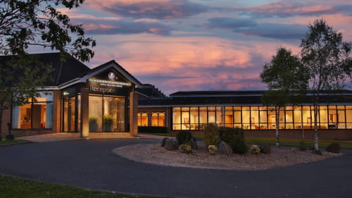 Image of hotel at dusk